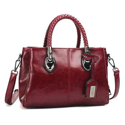 Pia - Elegant Leather Handbag with Braided Handle